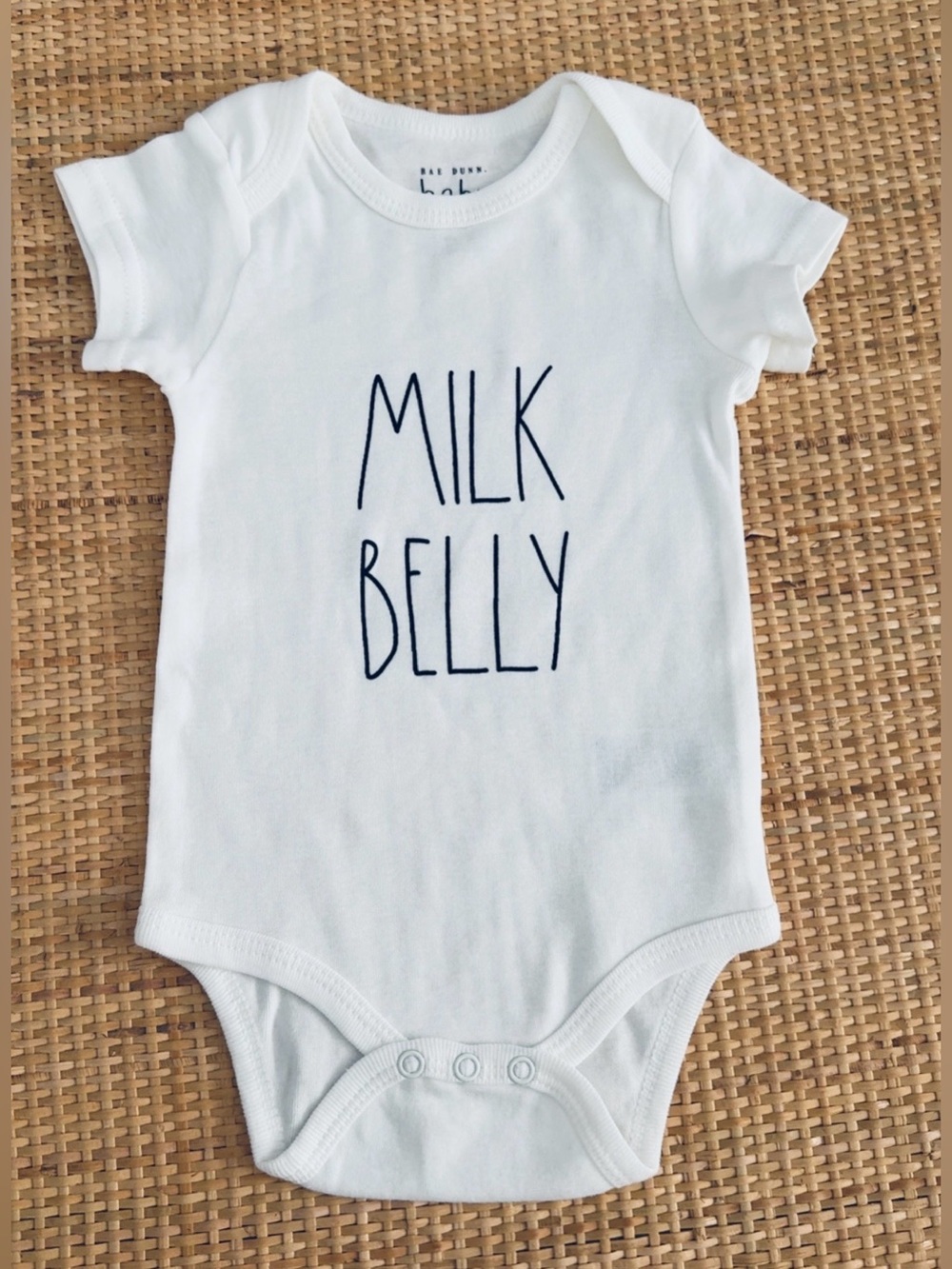 Rae Dunn White Short-Sleeve 'Milk Belly' Onesie• Size 6-9 months